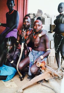 Bana men decorating their head gear and preparation to leave village on a hunting trip. (Centre left: Wor ray Altay, centre right: My ah Altay, Left foreground seated: I kay Dammu)